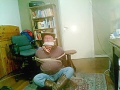 Cowboy In Dark Red Shirt Being Hold As Hostage