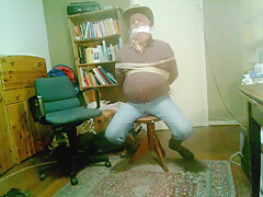 Cowboy In Dark Red Shirt Tied Up And Gagged