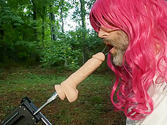Crossdresser gets used by a fucking machine outdoors