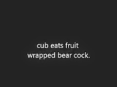Guy eats fruit wrapped bear jock