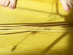 Moaning guy gets a tough spanking from machine with wooden canes