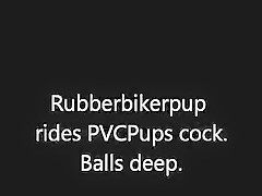 Rubberbikerpup rides PVCPups knob. Balls unfathomable.